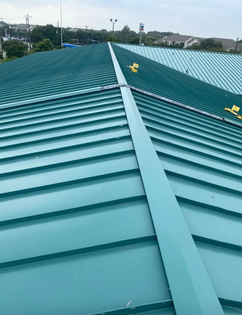 Green commercial metal roof ridge and valley for Metal Roof Repair in Havelock